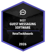 Hexagonal badge reading 'Best Guest Messaging Software HotelTechAwards 2026' on a dark background with a world map pattern.